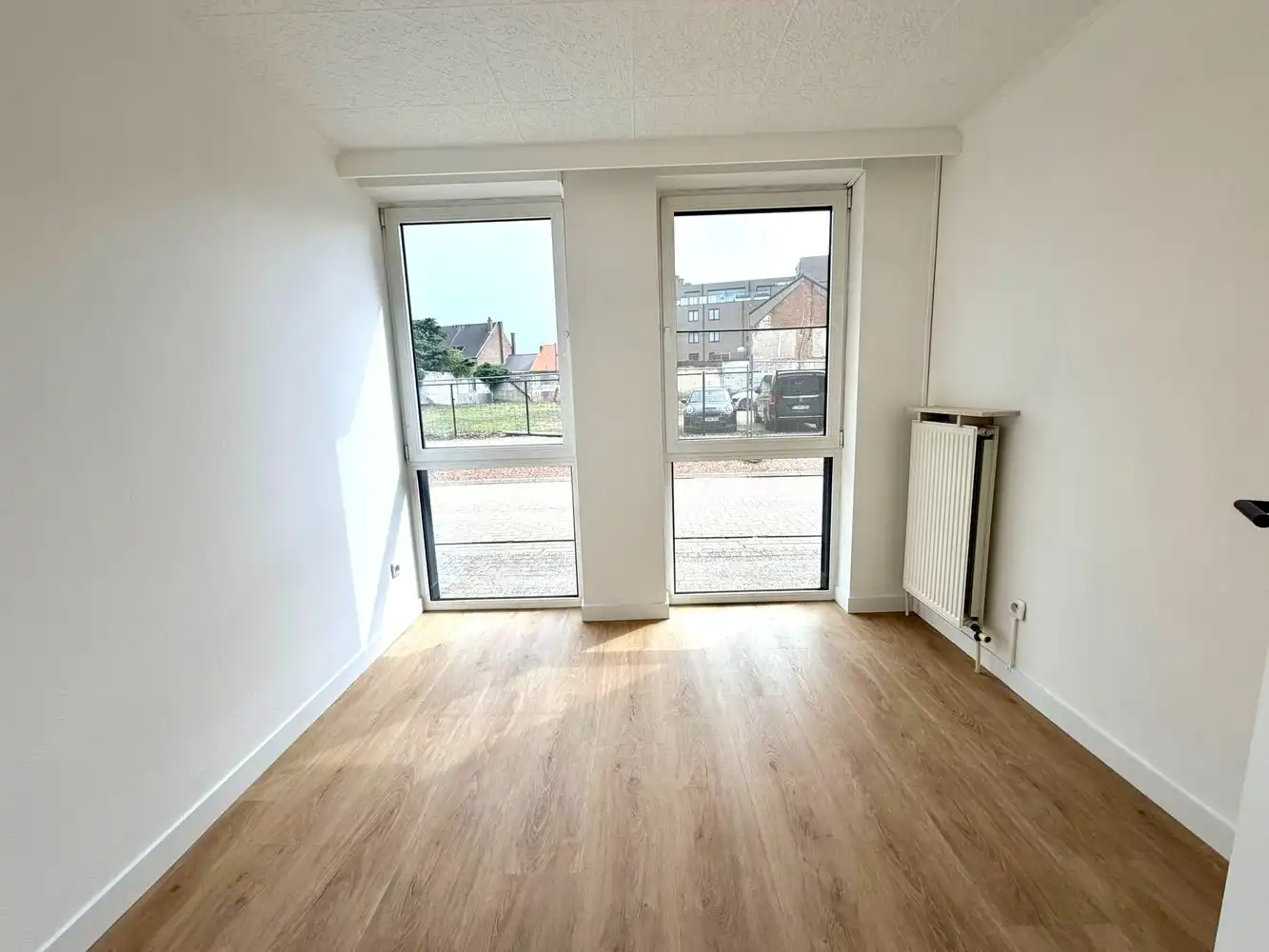 Gelijkvloers appartement met 2 slaapkamers en parking te huur in het centrum van Lanaken foto 14