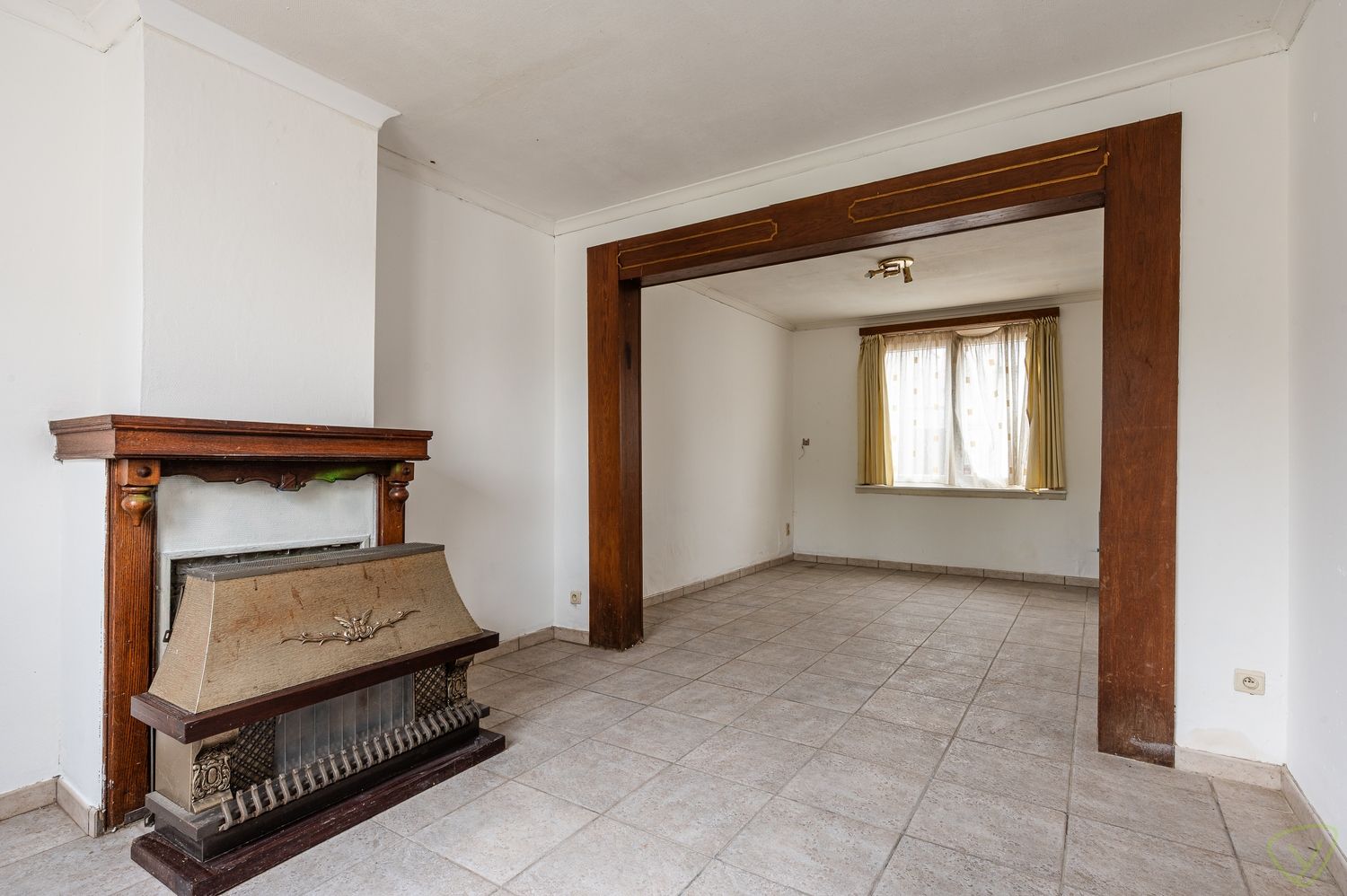 Te renoveren starterswoning met een verrassende tuin op een boogscheut van het centrum foto 3