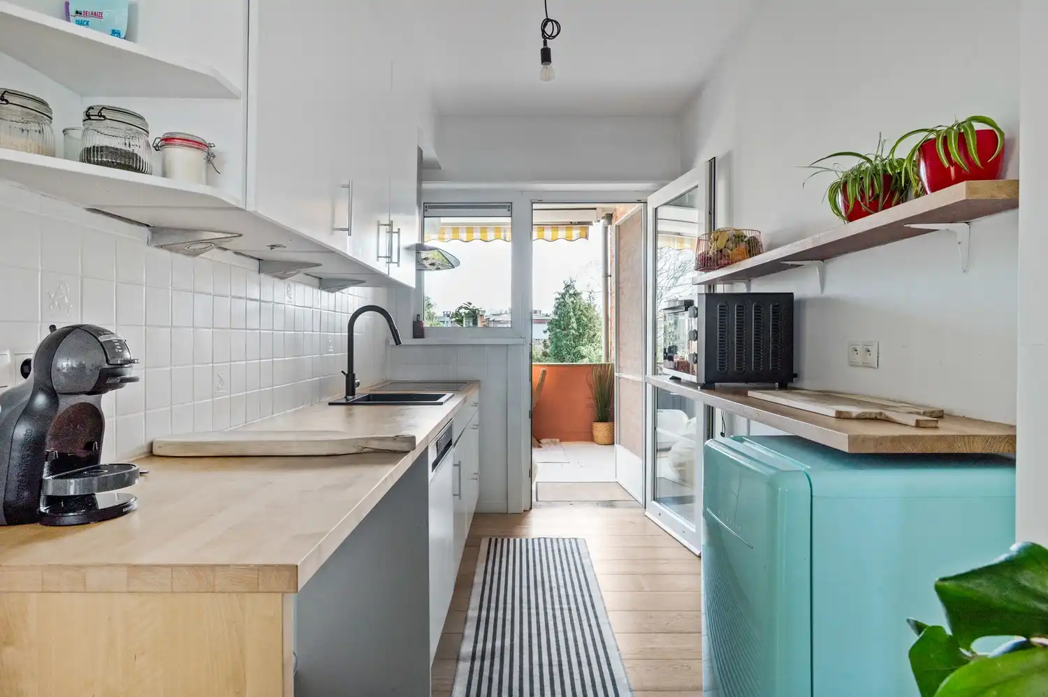 Charmant 2-slaapkamerappartement met terras in een rustige straat te Deurne foto 9