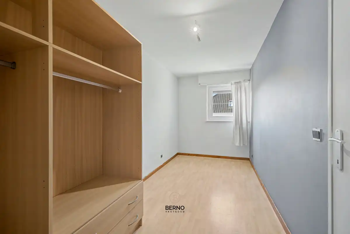 Centraal gelegen appartement met 2 slaapkamers foto 12