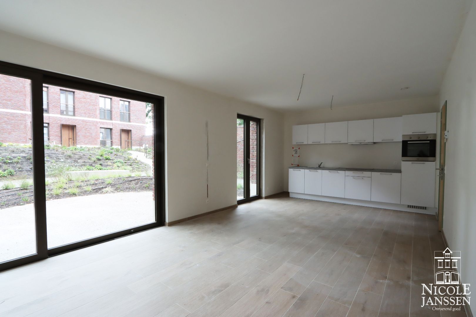 Nieuwbouwappartement met twee slaapkamers en autostandplaats in het centrum van Maaseik foto 4