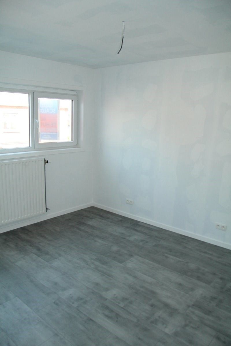 Uiterst ruime, recente woning met 3 slk, garage en tuin in centrum Berlare foto 13