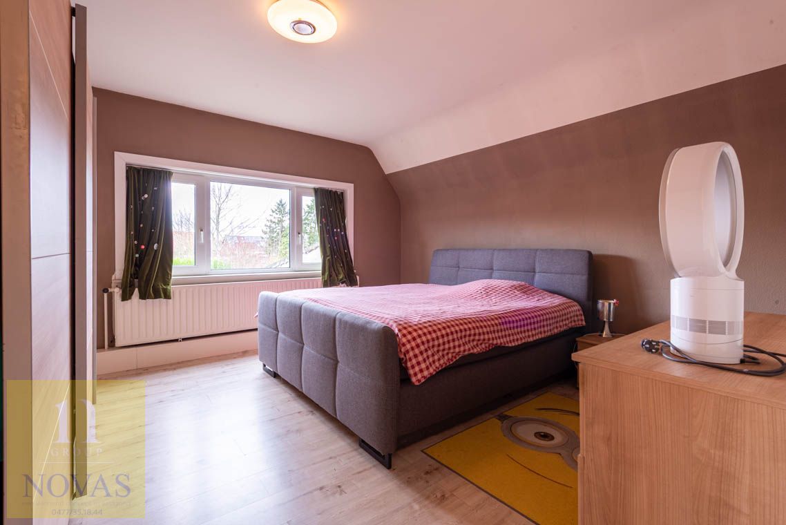 Gezellige woning met 3 slaapkamers, fijne woonkamer en diepe tuin foto 18