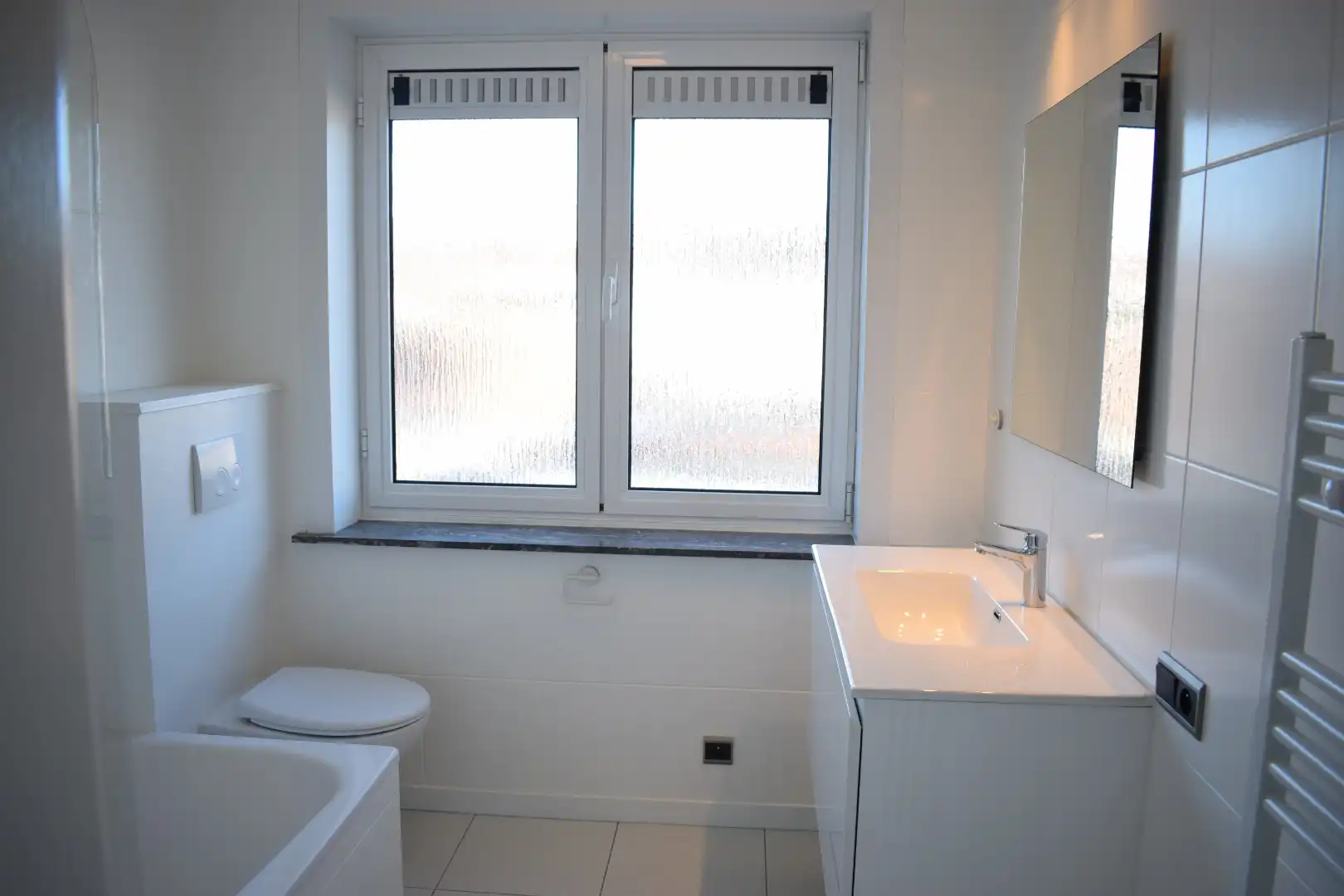 Rustig gelegen gerenoveerde woning met terras en tuin foto 12