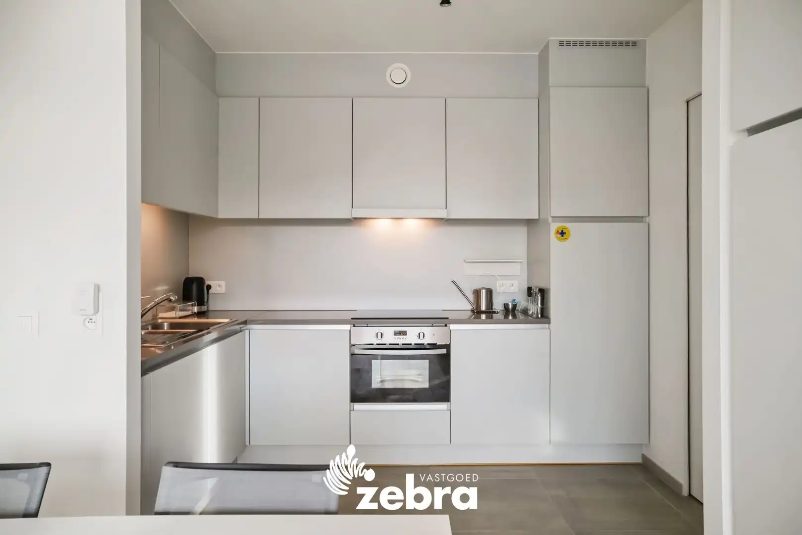 Moderne serviceflat met prachtig zicht op de Leie en autostaanplaats te Deinze! foto 6