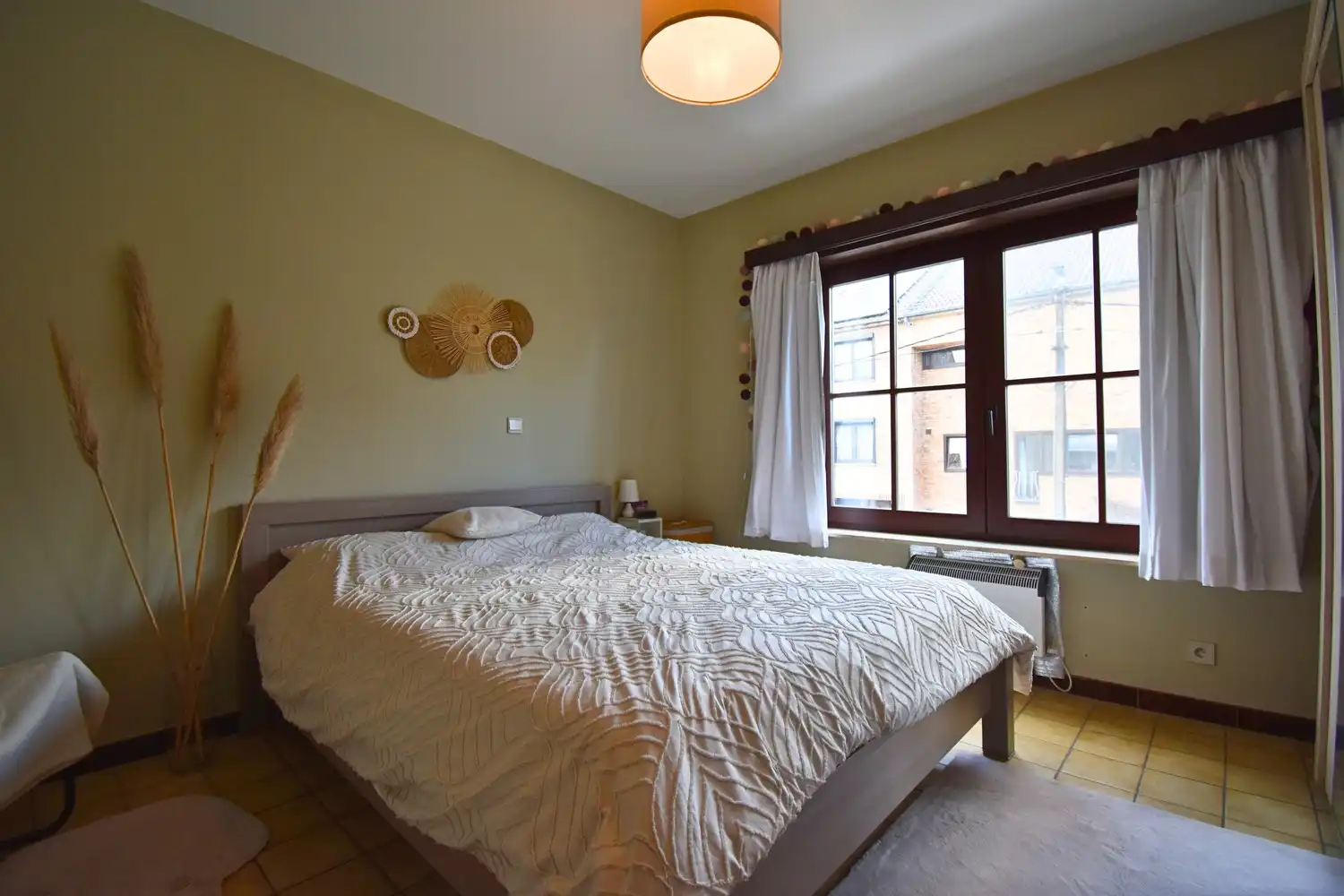 Gezellig 2-kamer appartement met terras én tuin foto 7
