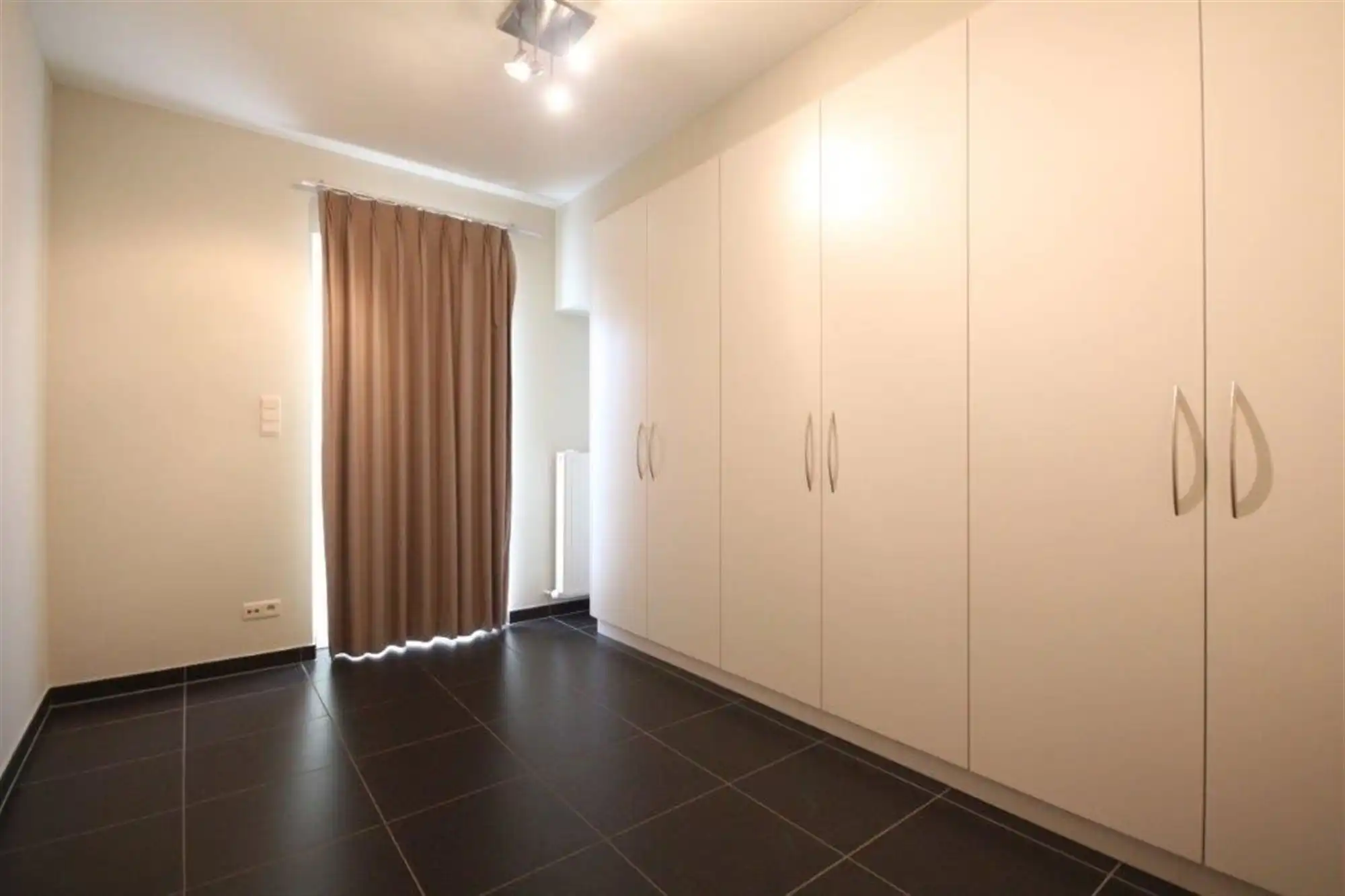 Verrassend ruim gelijkvloers appartement te Putte foto 8