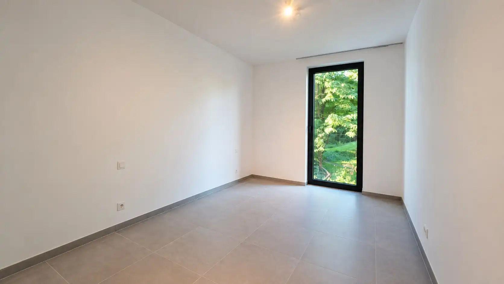 Modern en energiezuinig appartement met ruim terras in groene omgeving foto 9