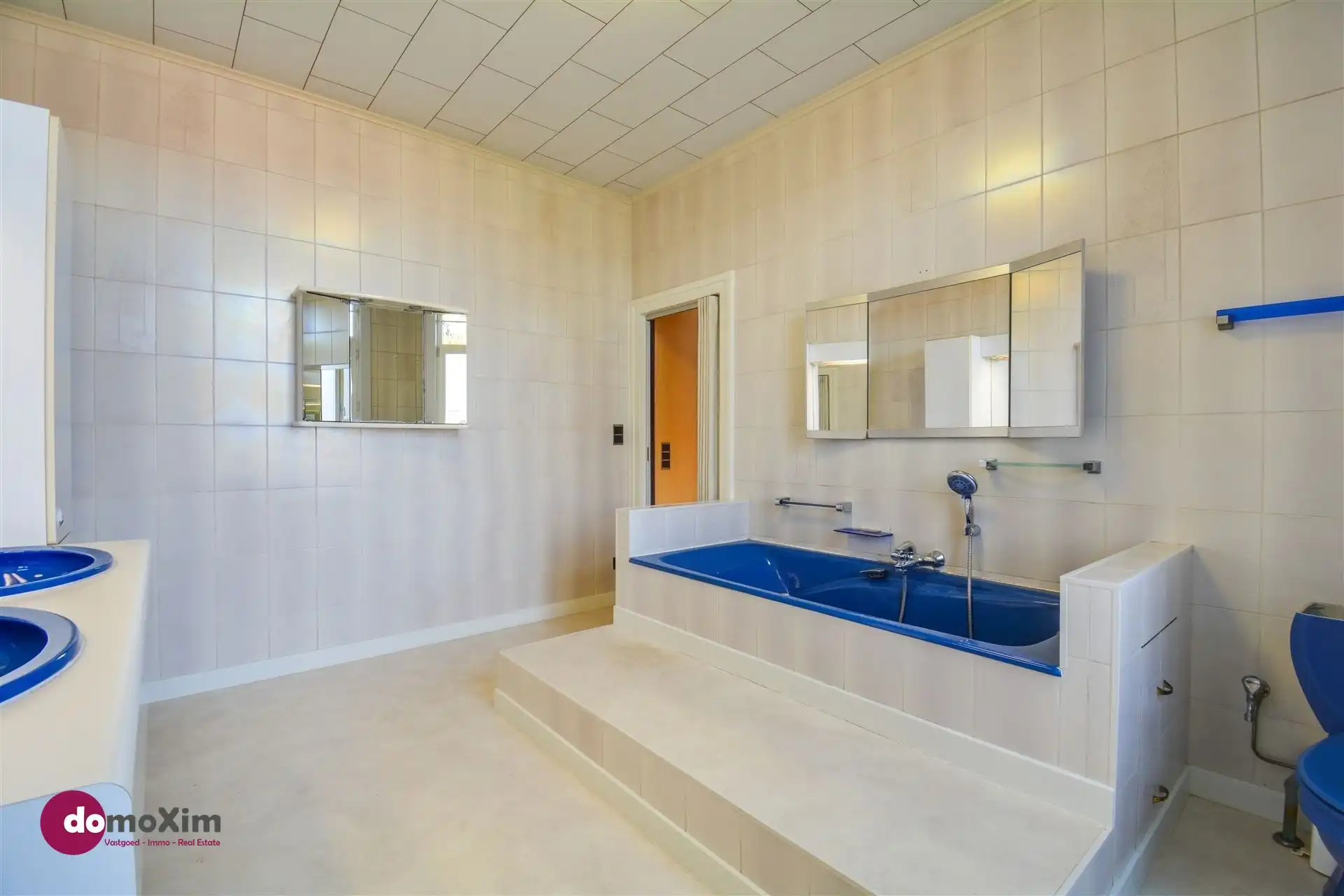 Ruime, karaktervolle stadswoning met twee garageboxen en tuin in Mechelen foto 19