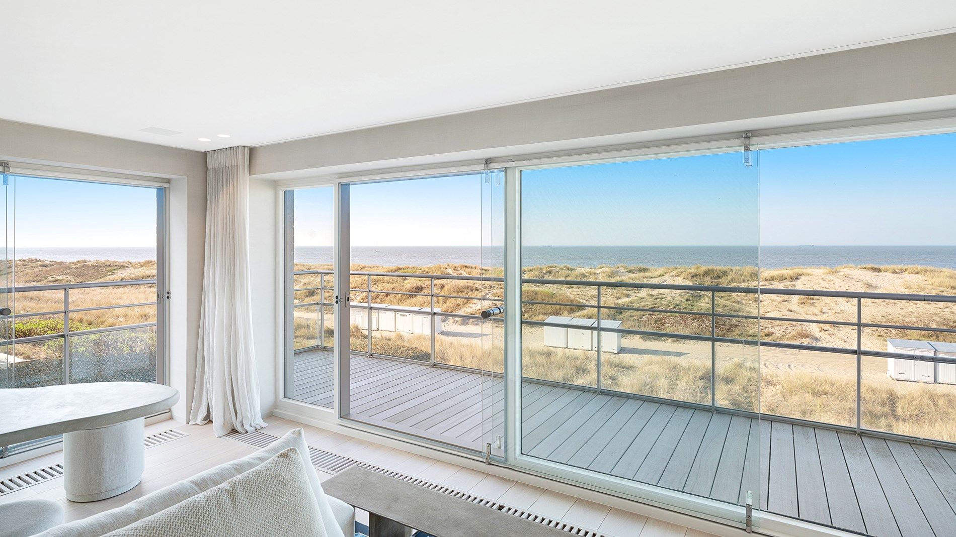 Uitzonderlijk hoekappartement met adembenemend zee-en duinenzicht langs de Wandeldijk in het Zoute foto 3