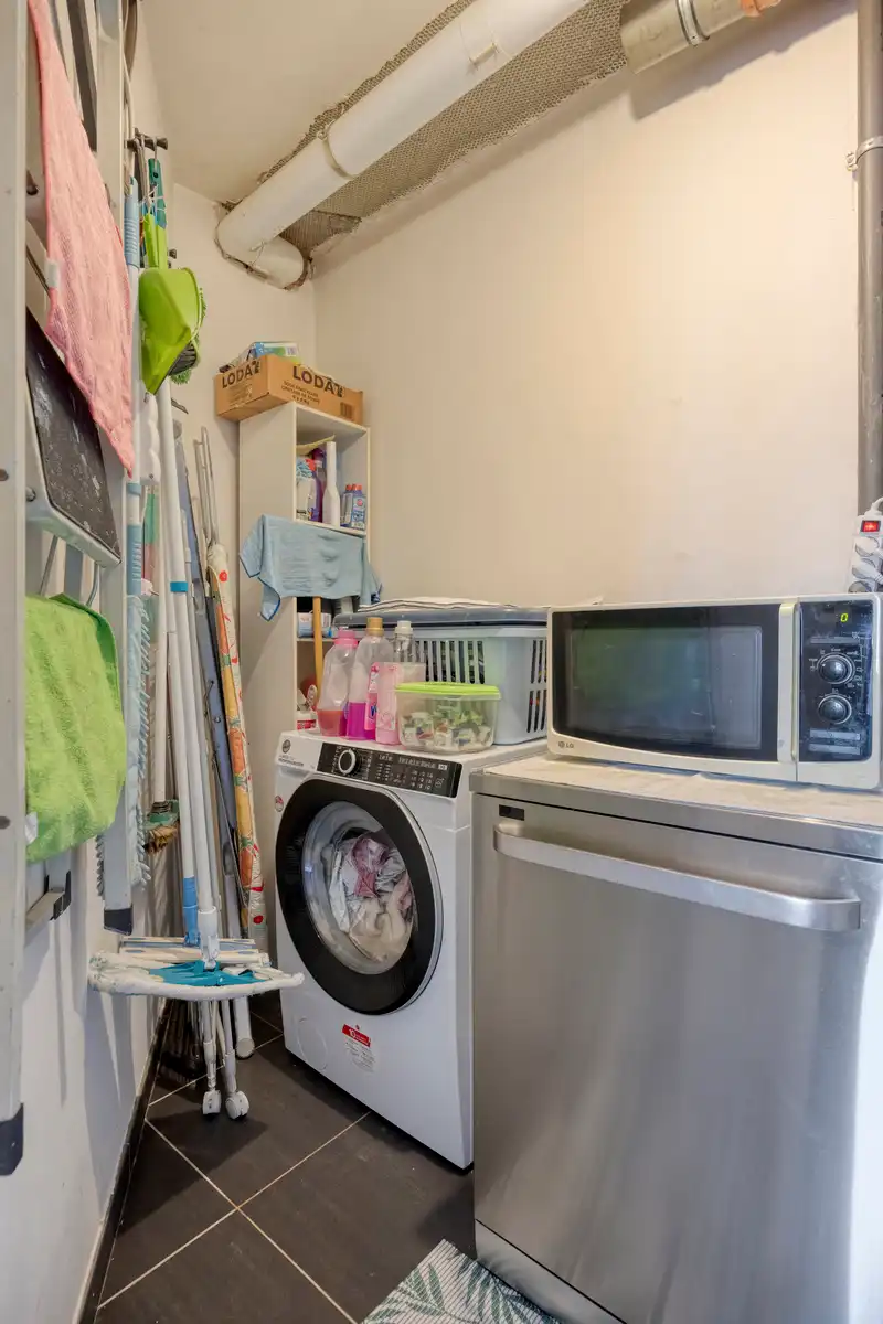 Energiezuinig Gelijkvloers appartement + garage  foto 16