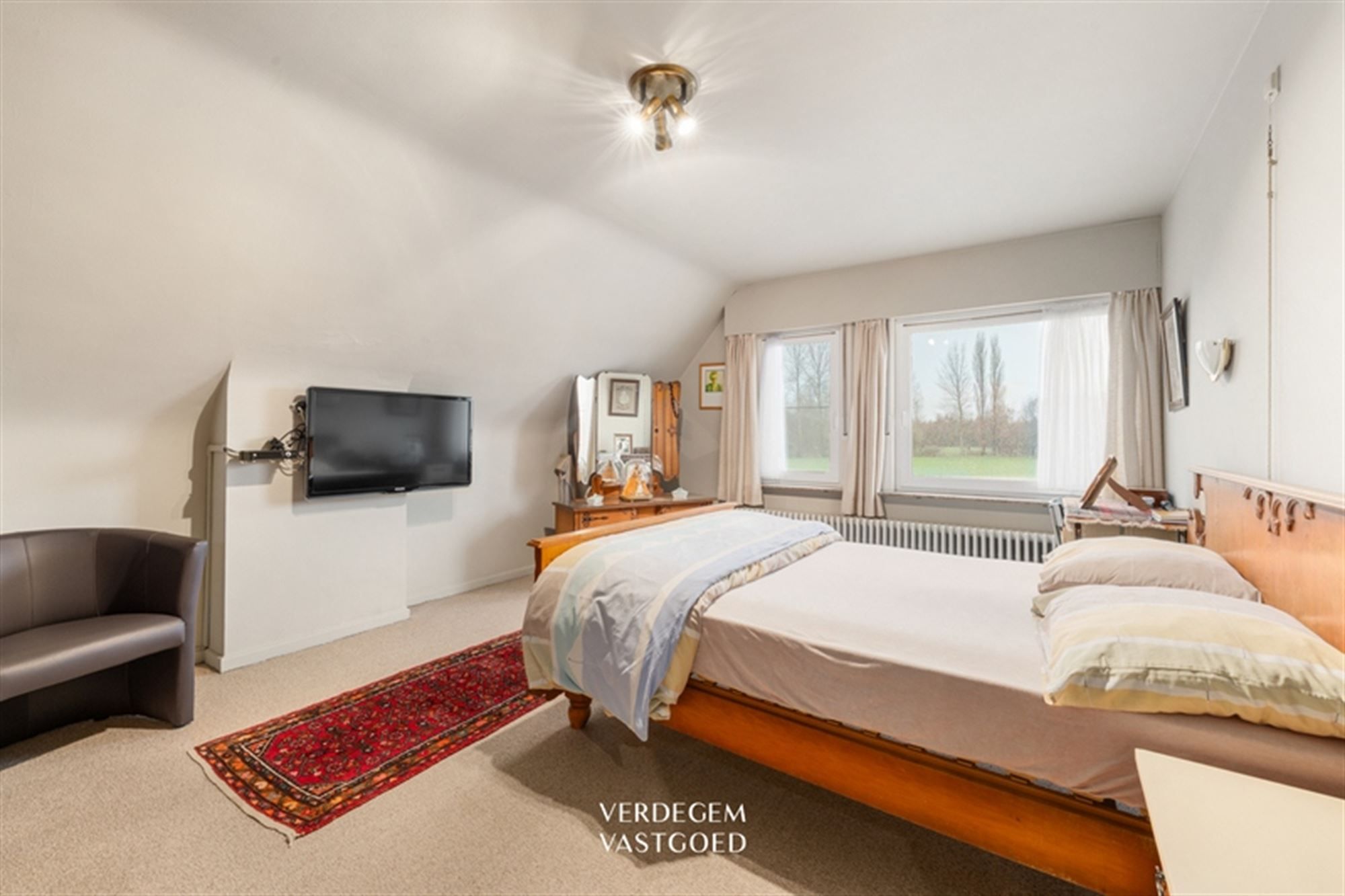 Karaktervolle woning met 3 slaapkamers, inpandige garage en tuin foto 13