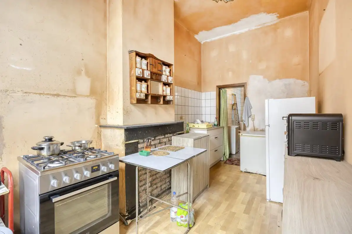 Opbrengsteigendom met renovatiepotentieel in Anderlecht foto 23