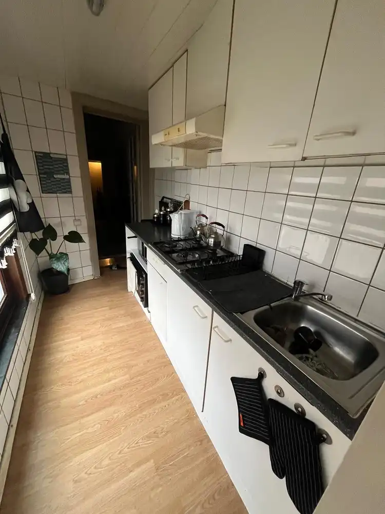 Rijwoning opgesplitst in twee appartementen foto 10