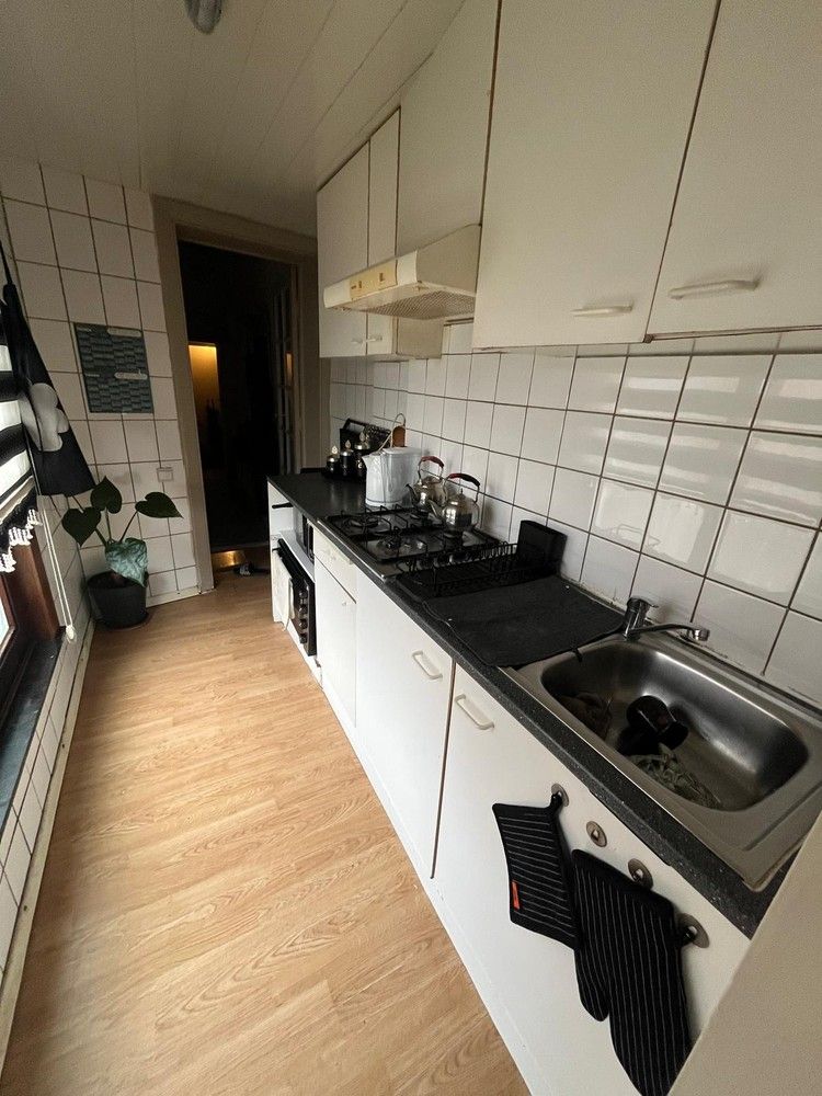 Rijwoning opgesplitst in twee appartementen foto 10