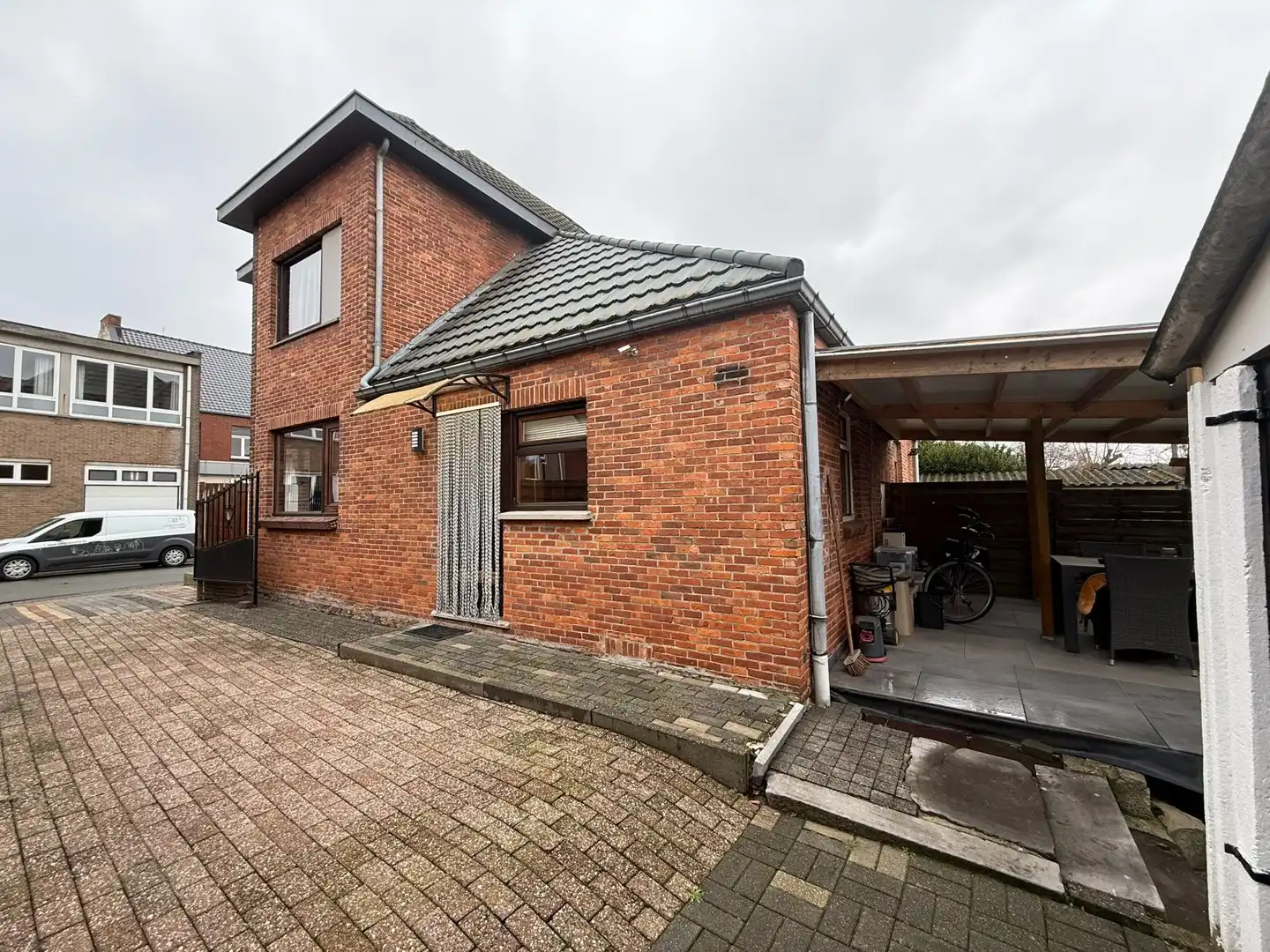 Opbrengsteigendom bestaande uit 2 halfopen woningen met garage en tuin te Hechtel. foto 21