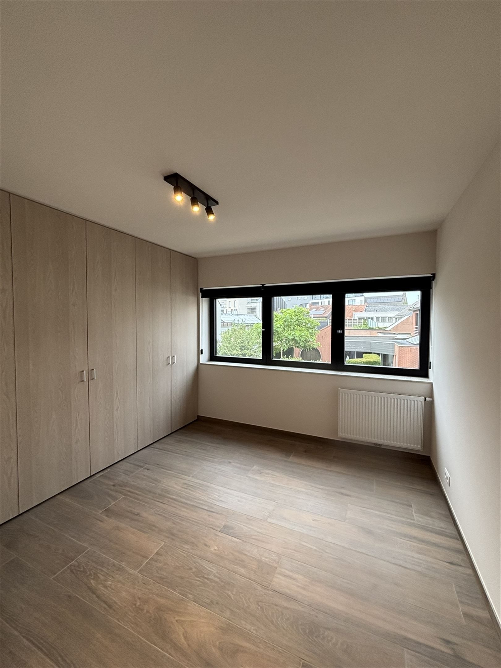Stadswoning met 3 slaapkamers en carport foto 14