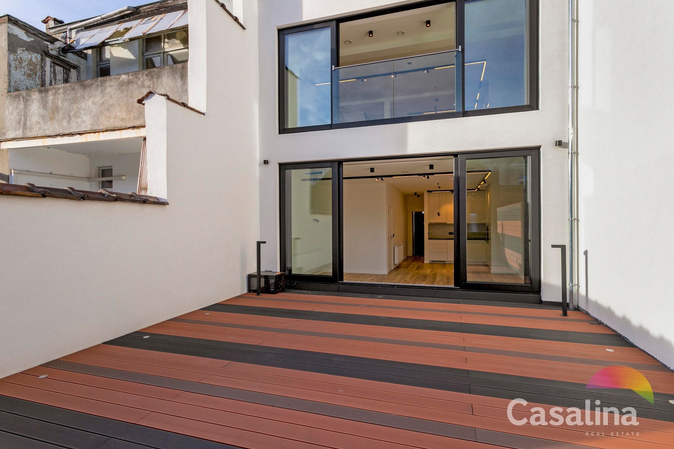 Prachtig high-end renovatieproject - 1 slpk met groot terras foto 2
