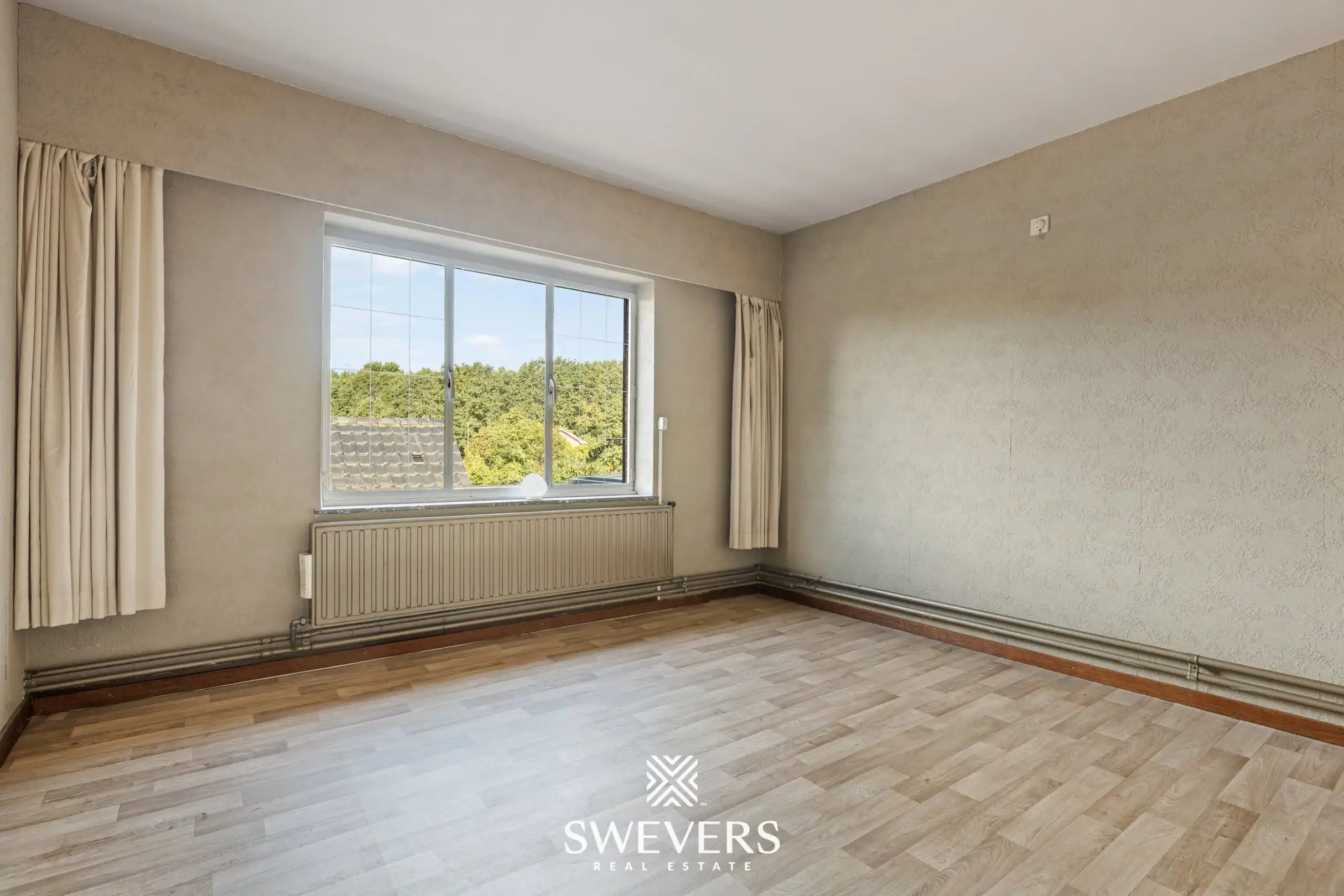 Ruime te renoveren woning op zonnig (ZW) perceel van 12a 33ca in het centrale Lummen foto 24
