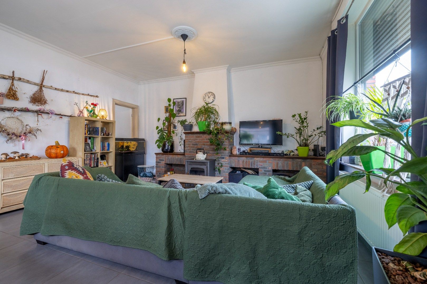 Super gezellige hoekwoning met 3 slk, overdekte koer en garage in Berlare centrum foto 2