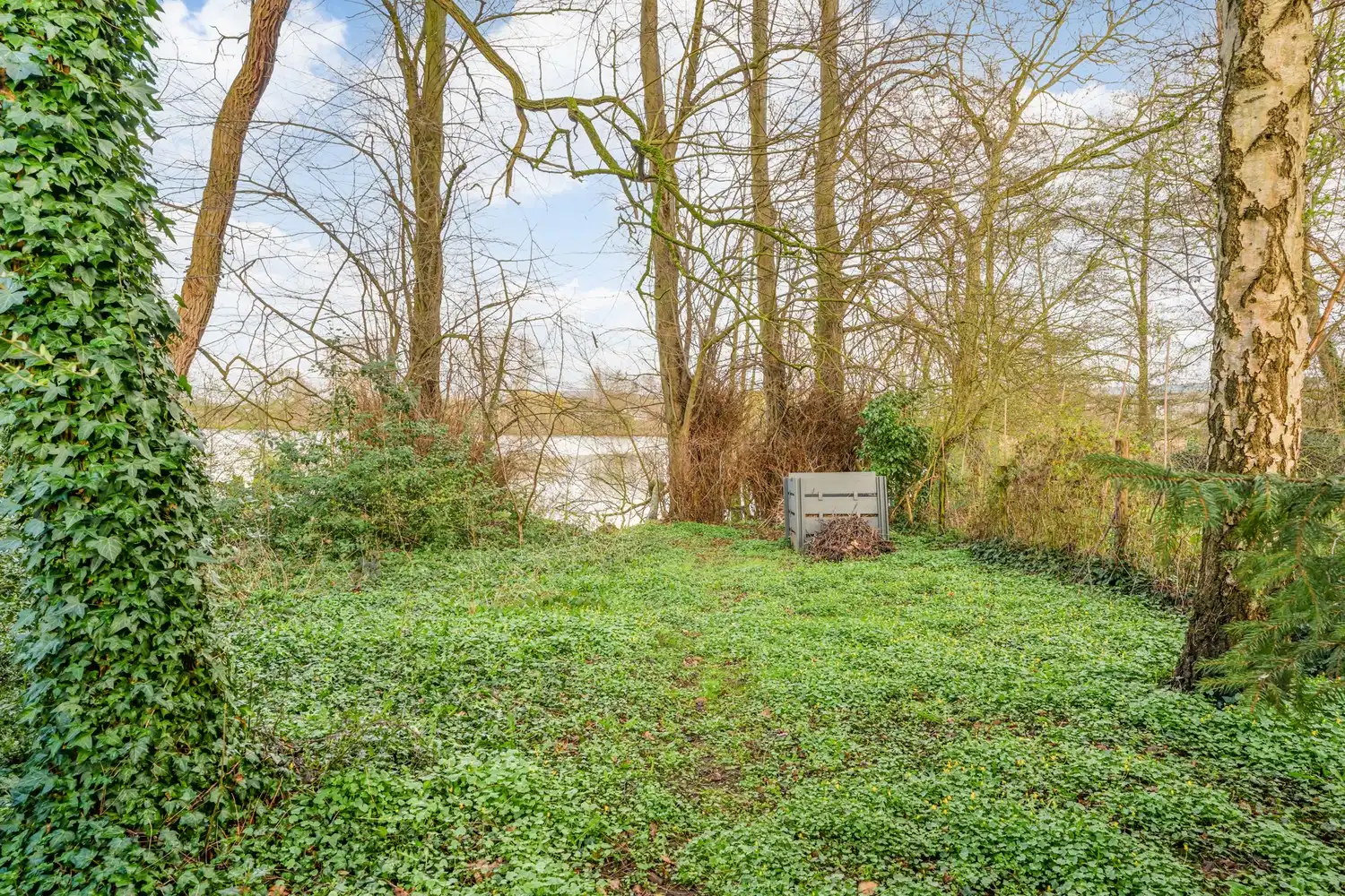 Gelijkvloers appartement met 2 slaapkamers, een ruim terras, 2 autostaanplaatsen, een kelder en een tuin grenzend aan de Vijvers van Bellefroid te Leuven! foto 21