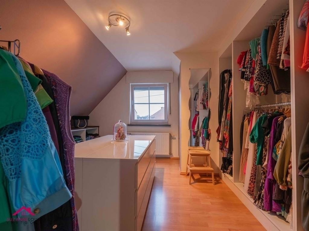 Stijlvolle vrijstaande woning met ruimte voor vrij beroep, garage en verwarmd zwembad op ruim perceel foto 28