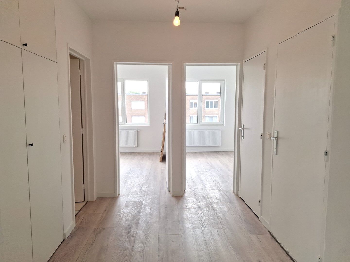 Lichtrijk appartement met 2 slaapkamers, 2 balkons, autostaanplaats en kelderberging foto 7