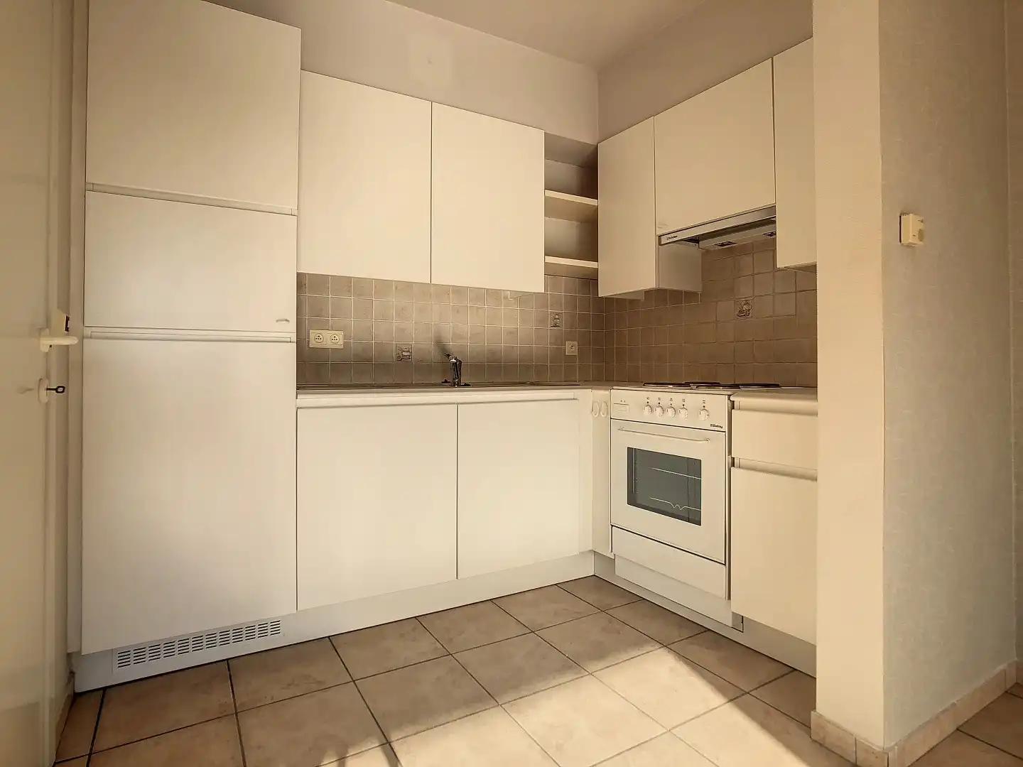 Centraal gelegen appartement met garage én extra staanplaats in centrum Staden foto 4