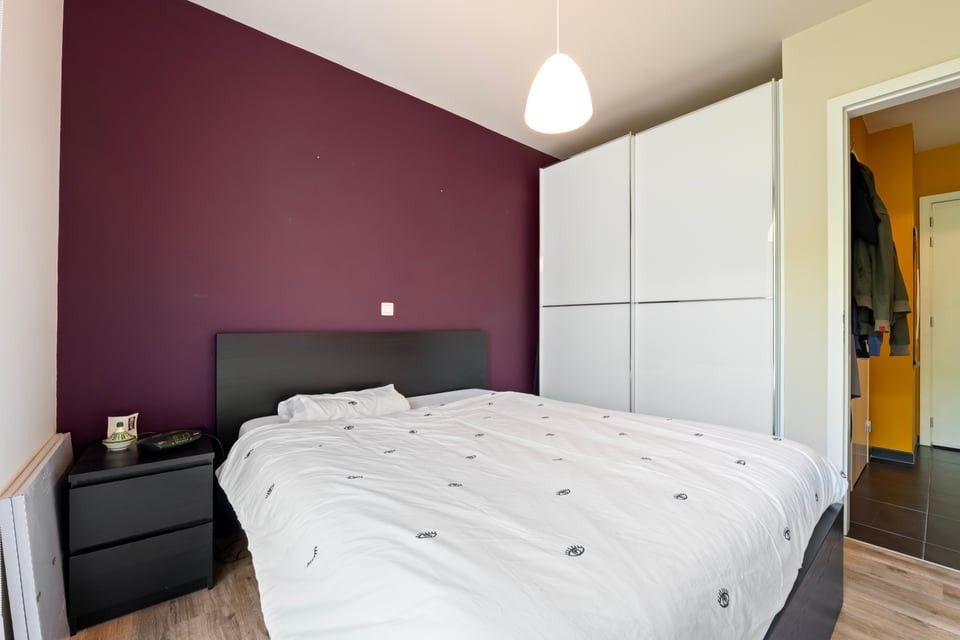 KNAP APPARTEMENT MET 1 SLAAPKAMER EN STAANPLAATS IN SINT-TRUIDEN foto 12