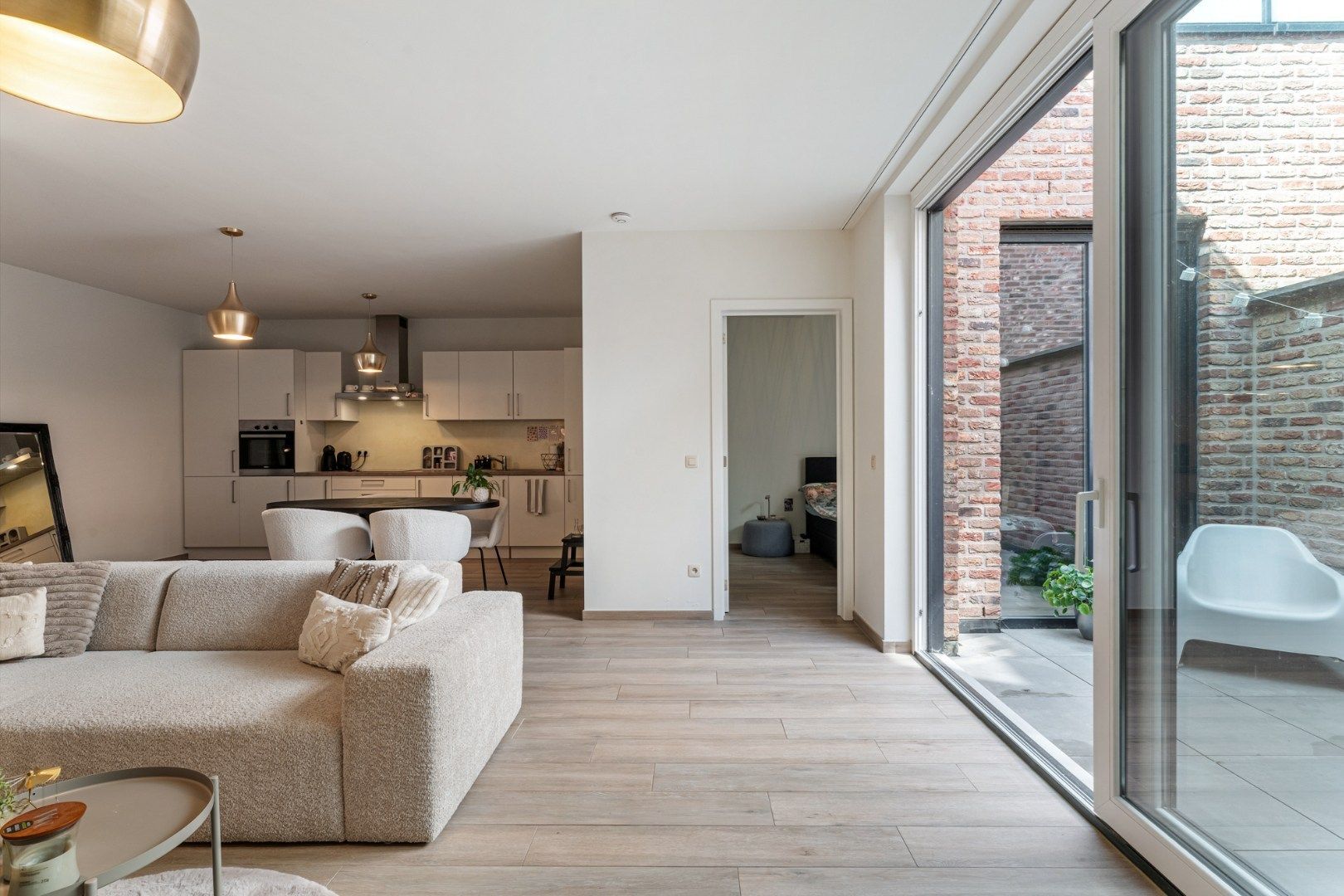 Recent, hoogwaardig afgewerkt gelijkvloers appartement, met terras en inpandige garage, in het centrum van Maaseik!  foto 15