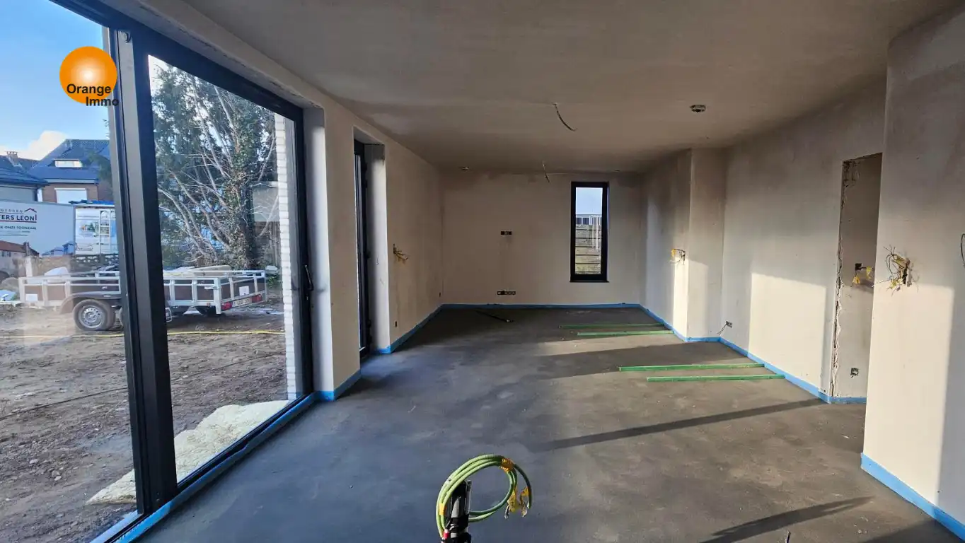 Luxe gelijkvloers appartement van 116m² met zonnig terras 23m² en tuin 177m² gelegen in het centrum van Maasmechelen.  foto 4