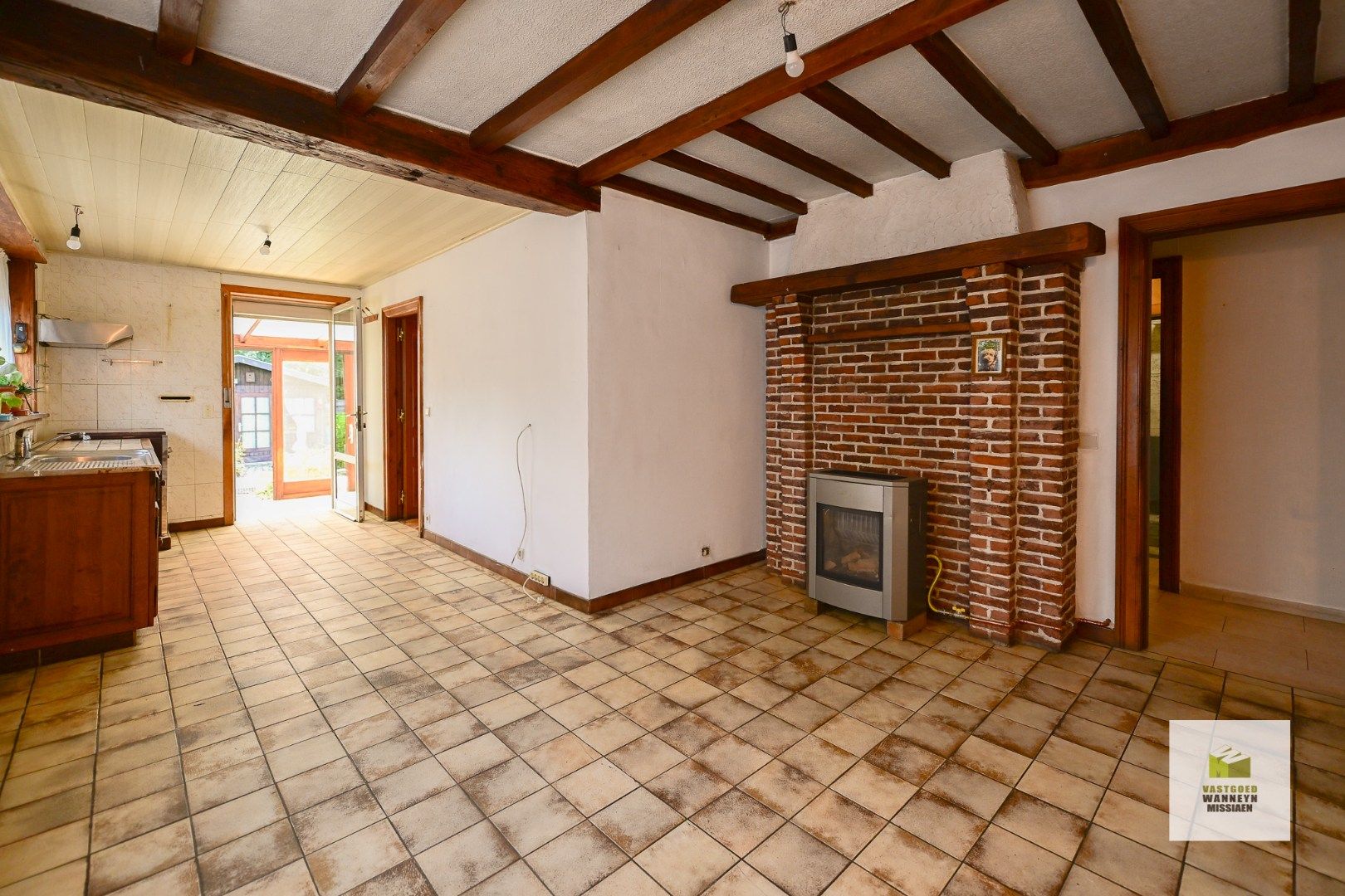 Te renoveren woning met 3 slaapkamers en zongerichte tuin op centrale ligging te Tielt foto 7
