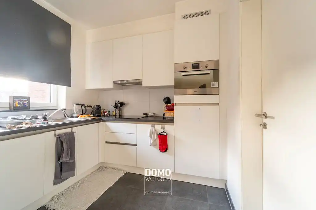 Instapklaar en lichtrijk 2-slaapkamerappartement met zonnig terras en parking in Diepenbeek foto 5