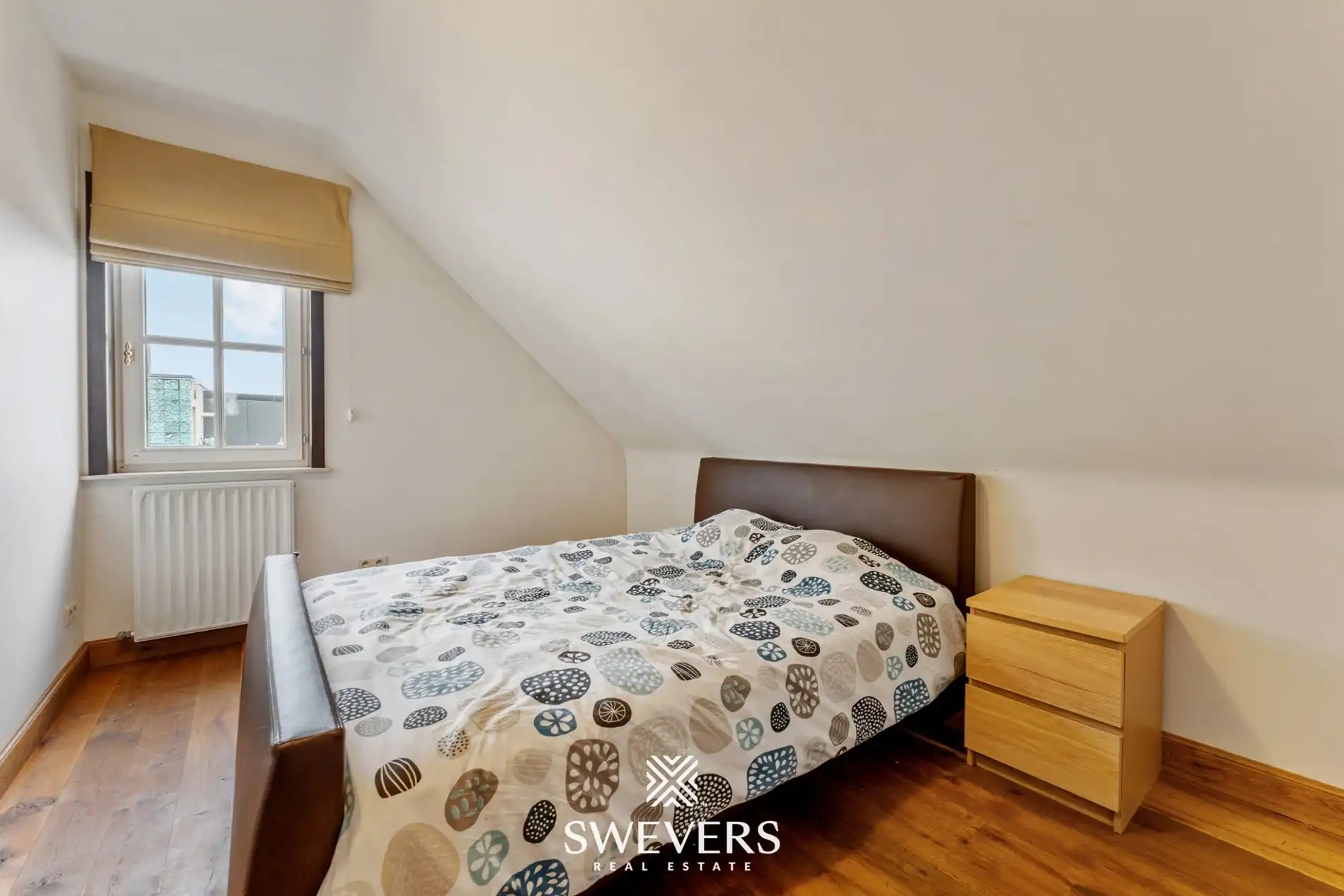 Ruime open bebouwing met 4 slaapkamers en zonnige tuin in Houthalen foto 24
