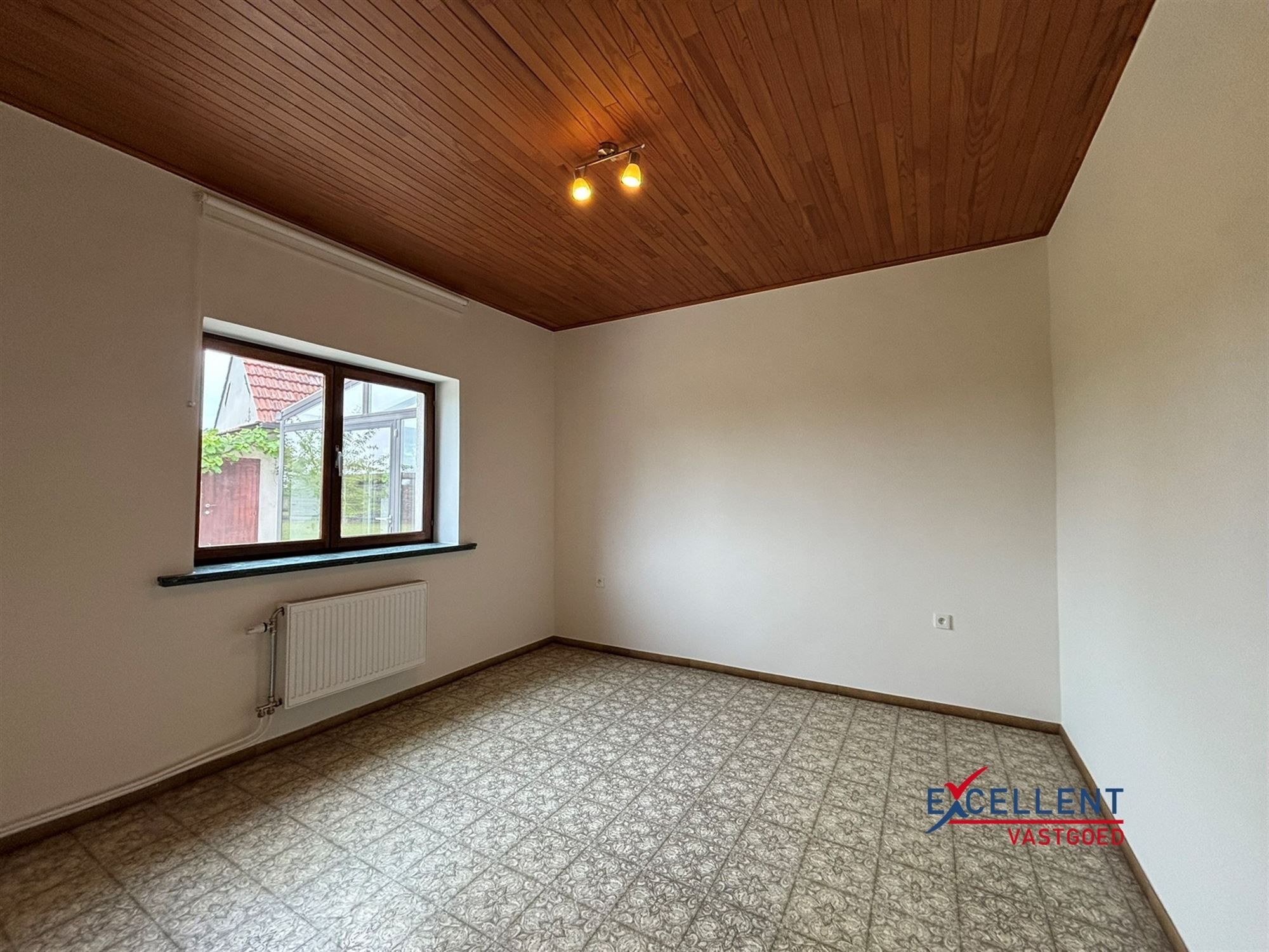 Gezinswoning met 4 slaapkamers & ruime tuin foto 9