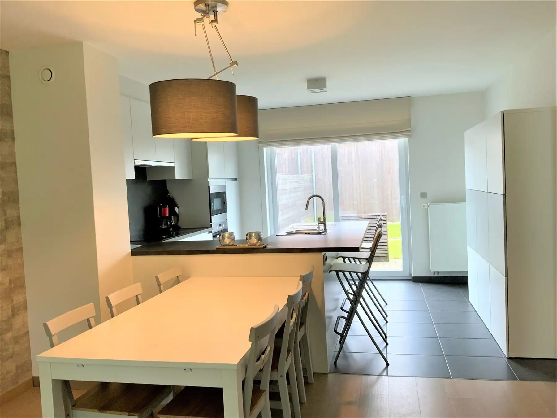 Recente instapklare woning met tuin foto 4