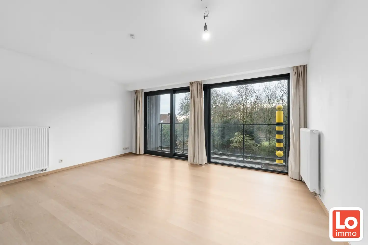Mooi appartement met 2 slaapkamers en zuid-gericht terras in centrum Lochristi foto 3