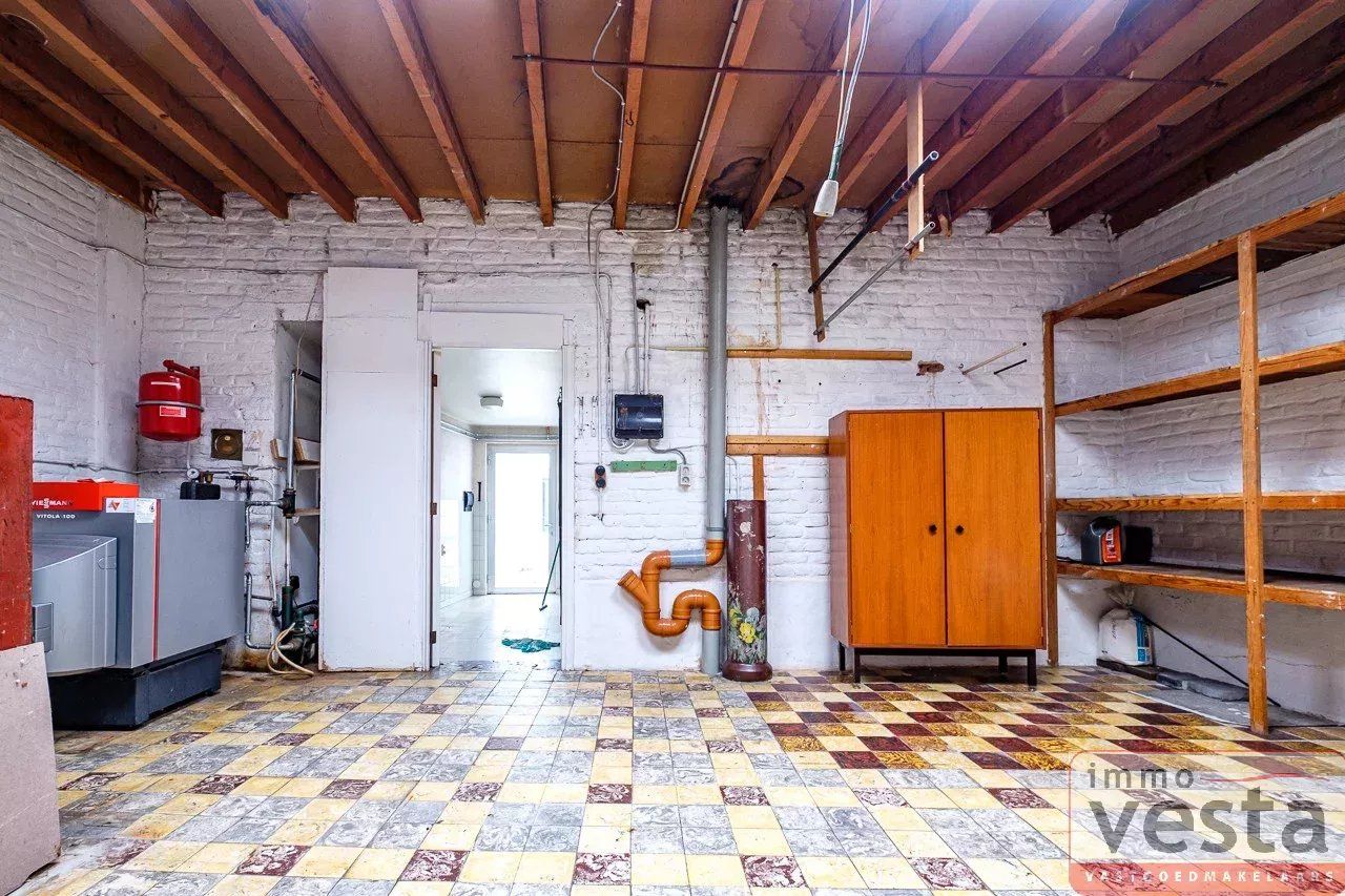 Te renoveren handelsruimte met woonst op toplocatie foto 11
