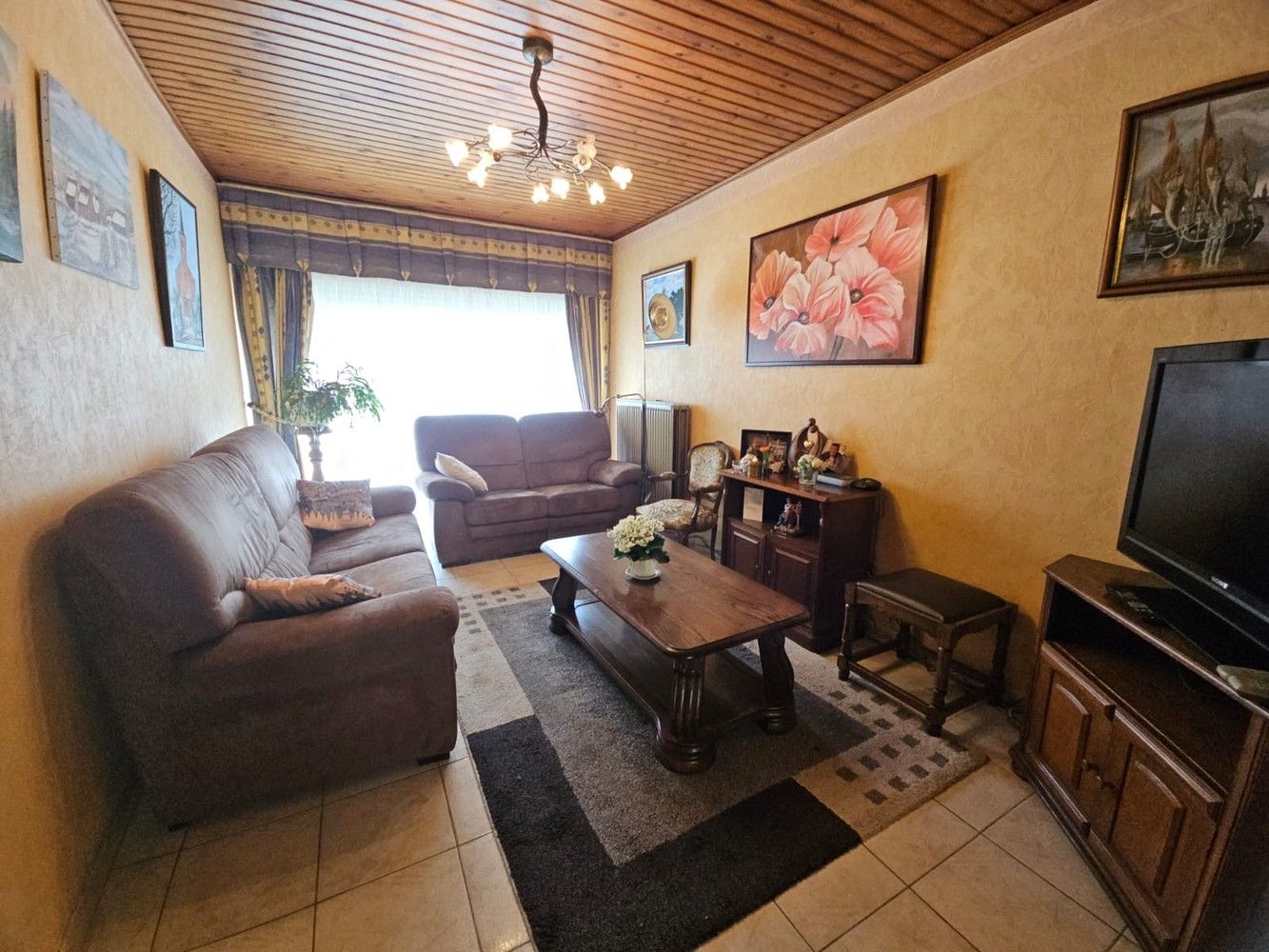 Ruime, solide woning met grote kelder, terras en tuin foto 10