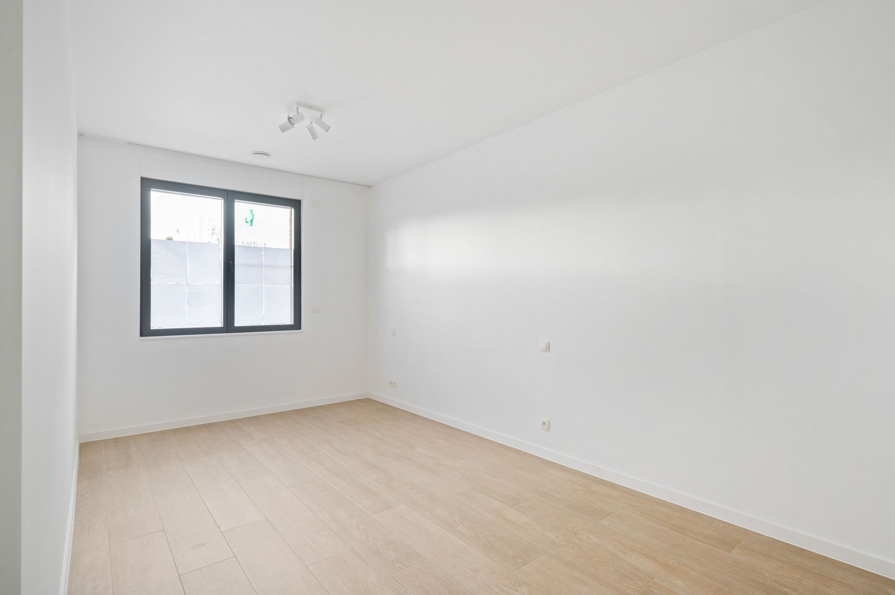 Nieuwbouw gelijkvloers appartement met staanplaats en kelder foto 11