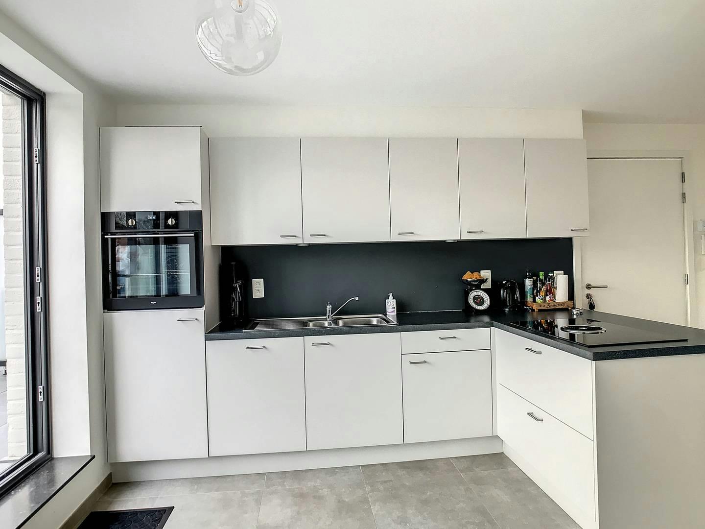 Modern dakappartement met 1 slaapkamer te huur in Kalmthout! foto 4
