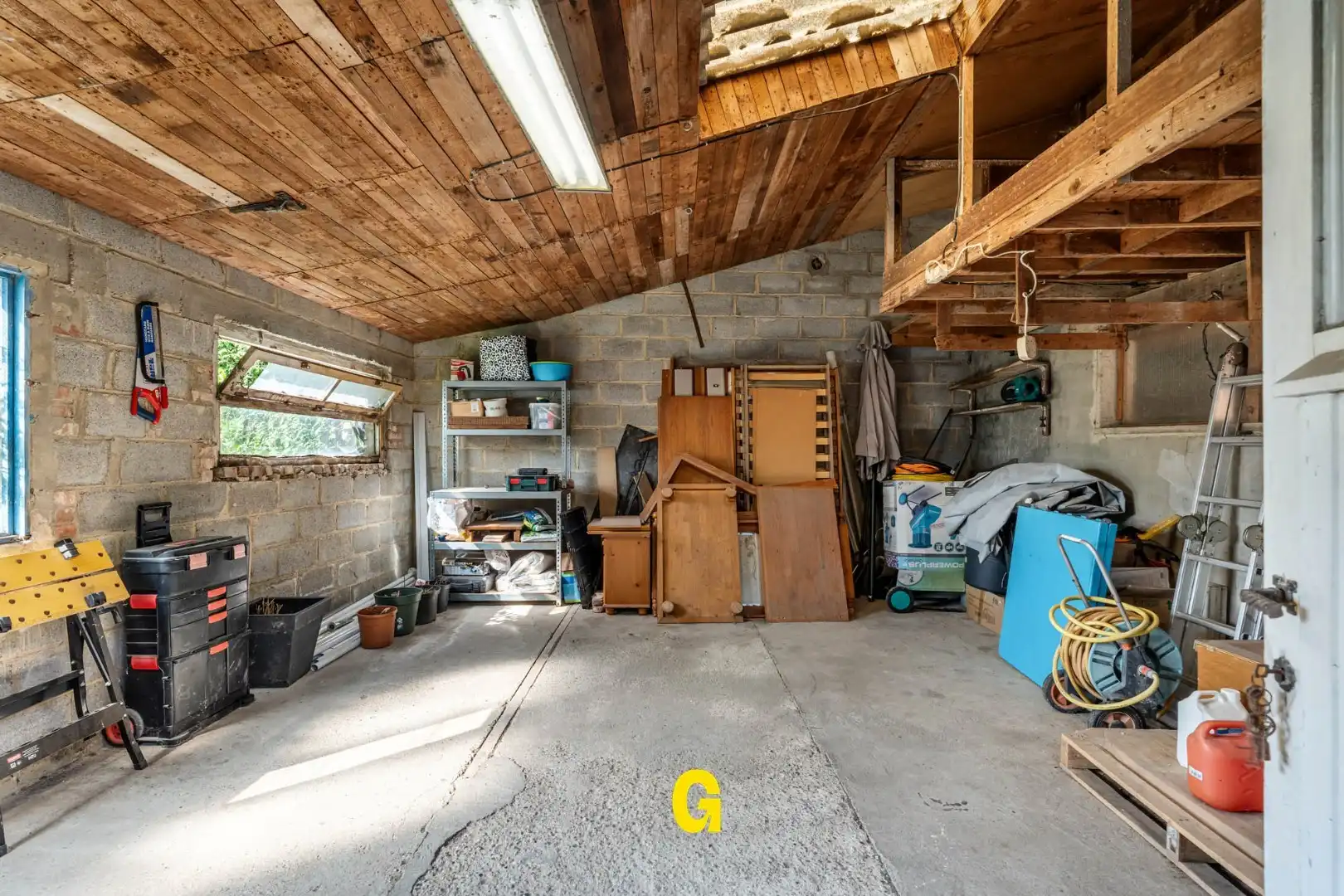 Grondig te renoveren woning met degelijke structuur en ruime tuin op 10a 67ca, met weids zicht op de achtergelegen glooiende groene omgeving foto 23