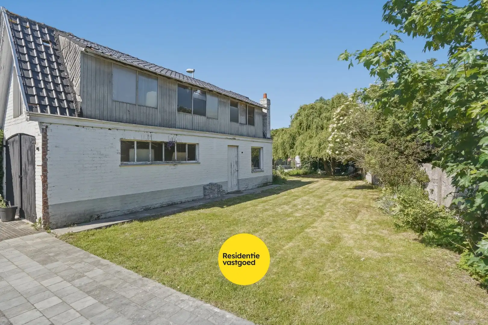 Alleenstaande woning met prachtige uitbouw in centrum Veldegem foto 24