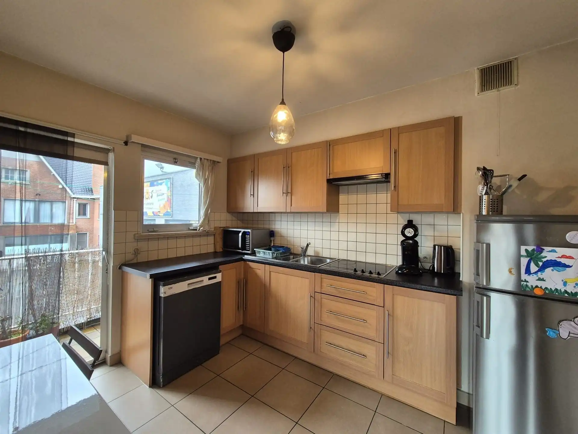 Interessant gelegen appartement met terras en garage. foto 10