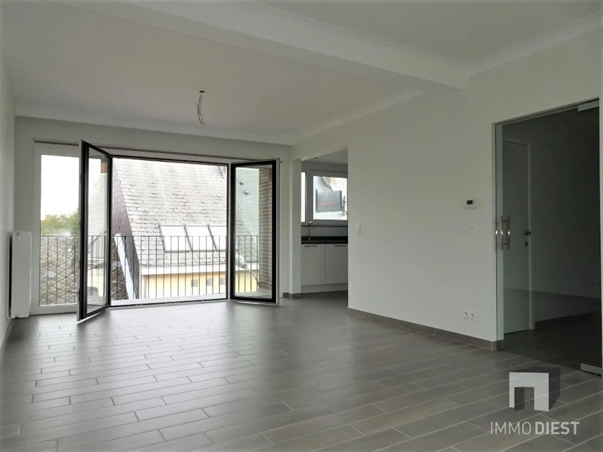 Dakappartement in het centrum van Diest foto {{pictureIndex}}