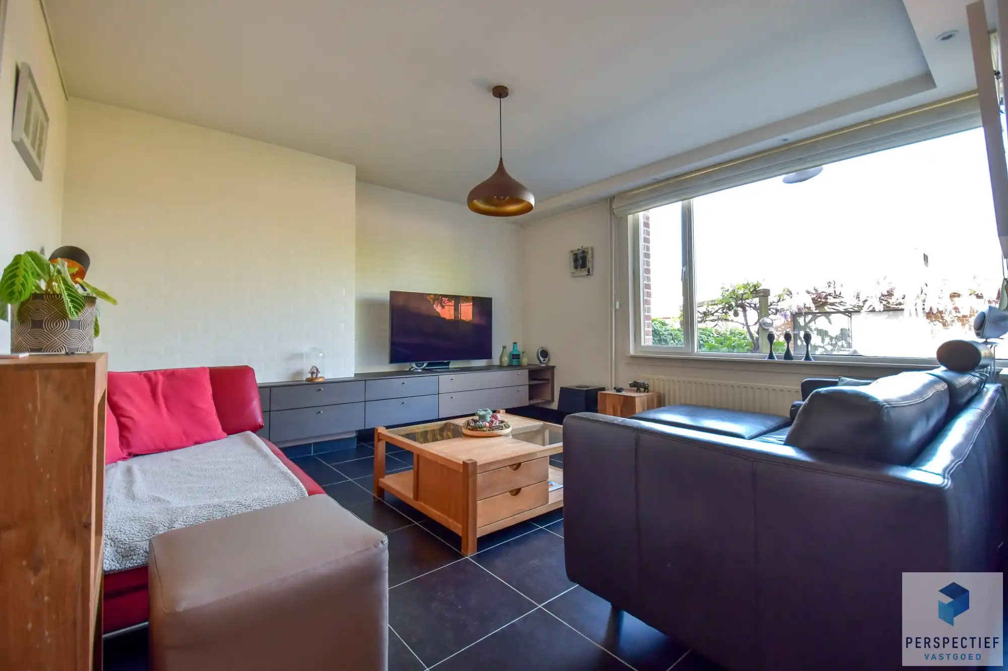 Ruime goed onderhouden woning met 3 slpk en tuin foto 10