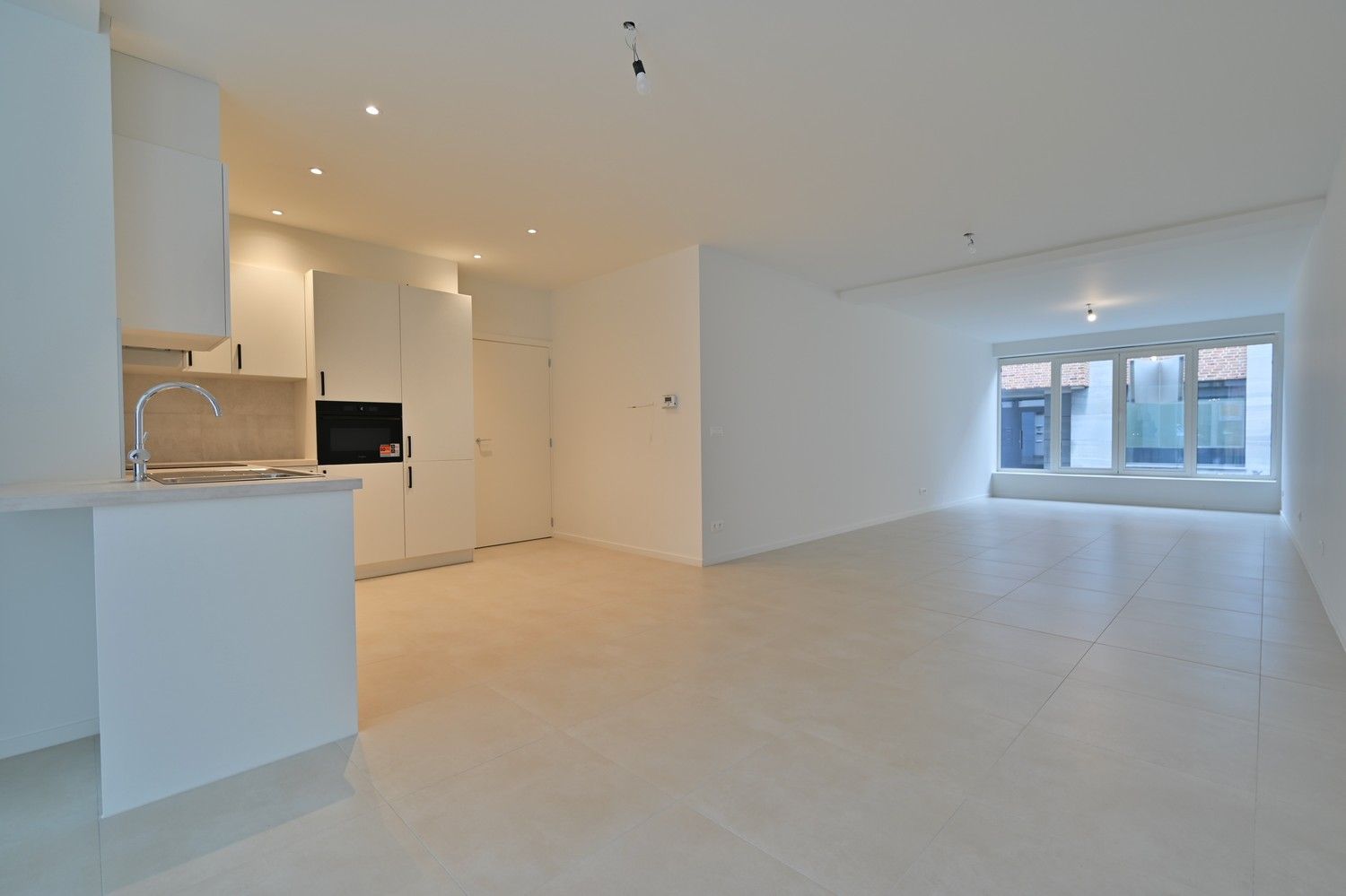 Nieuw appartement van ± 130 m² met 2 slaapkamer in bestaande residentie, gelegen in het historische centrum van Maaseik foto 6