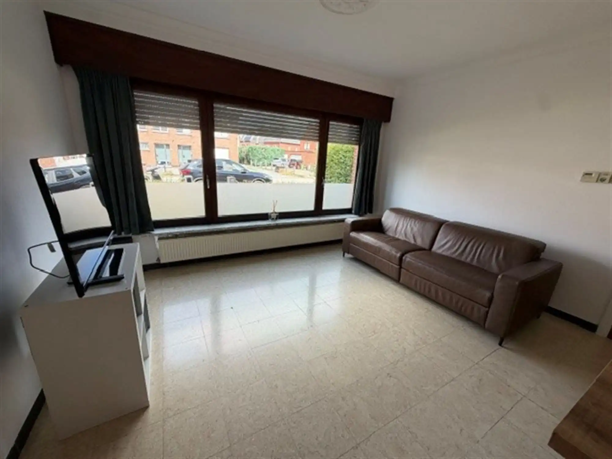 Zeer tof gelijkvloersappartement met tuin en garagebox foto 7