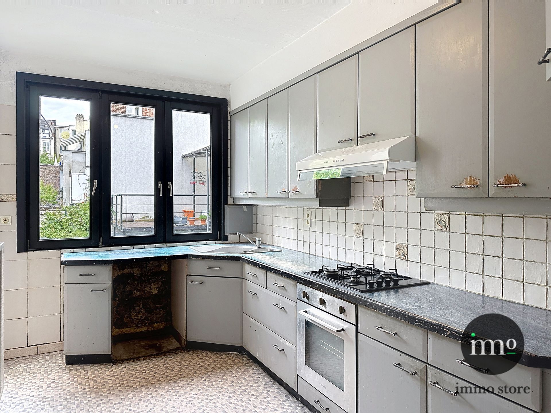 Goedgelegen rijwoning met 3, mogelijks 4 slaapkamers en tuin foto 7