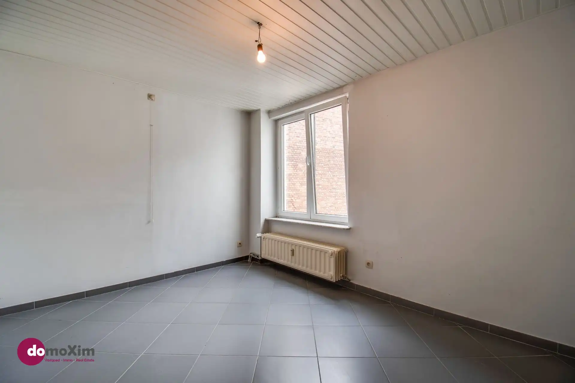 Opbrengsteigendom met 3 appartementen en garage nabij het station van Mechelen foto 9